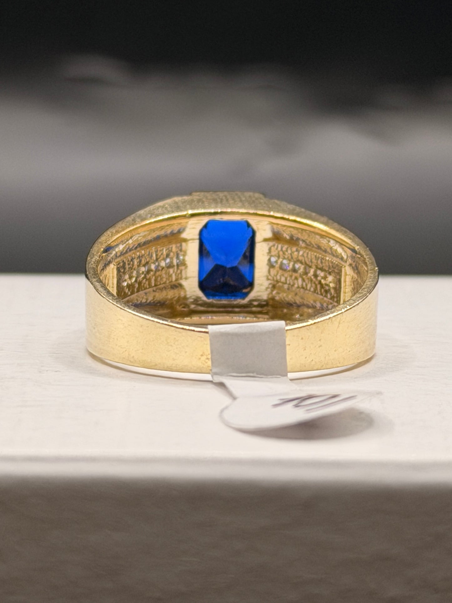 Men 10k yellow gold statement ring with blue center stone