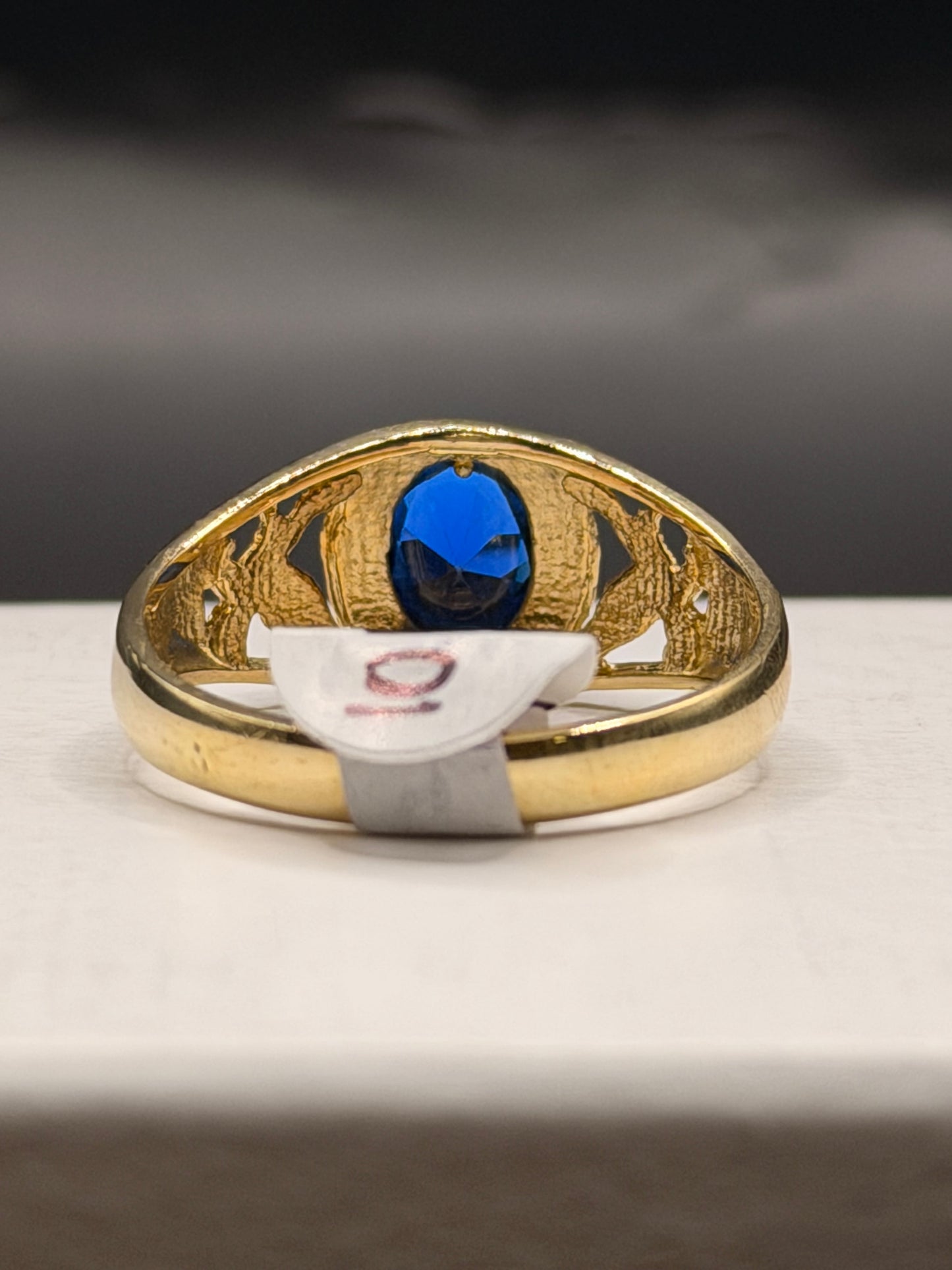Men’s 10k gold oval blue stone ring with eagle design