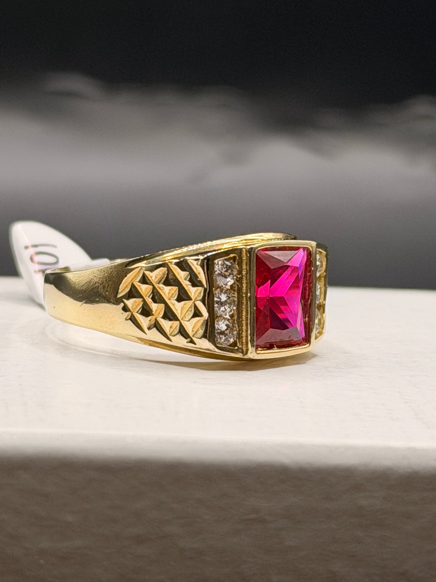 Men’s 10k yellow gold red stone ring with CZ accents