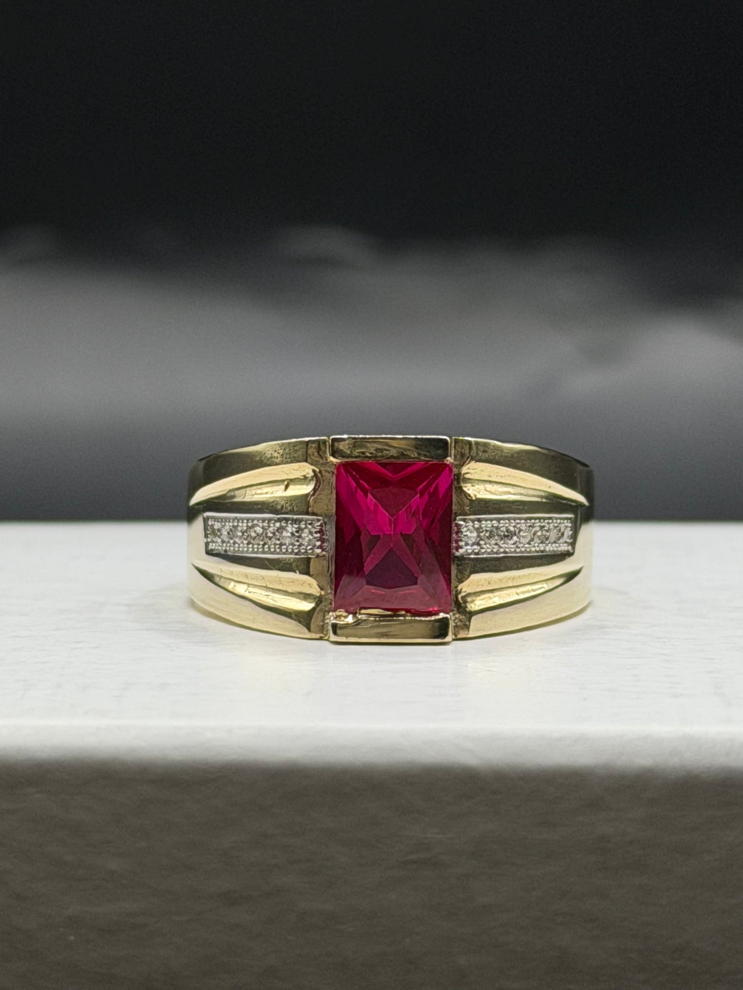 Men 10k yellow gold statement ring with blue center stone
