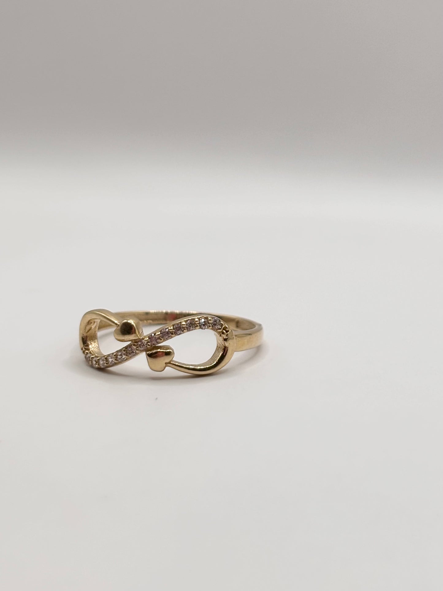 14k infiniti ring with heart design