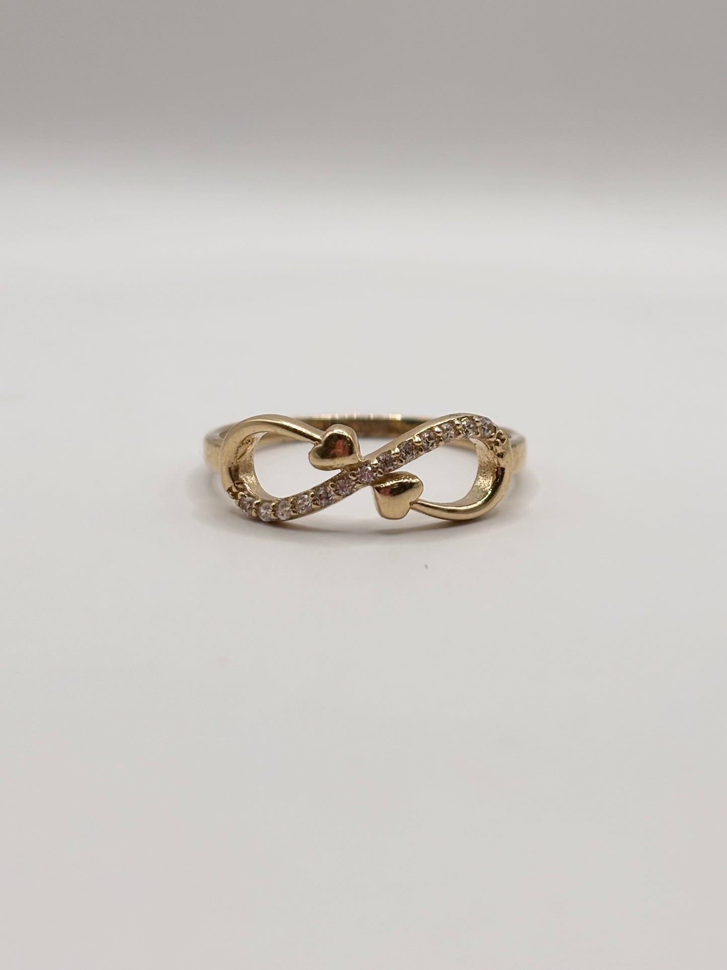 14k infiniti ring with heart design