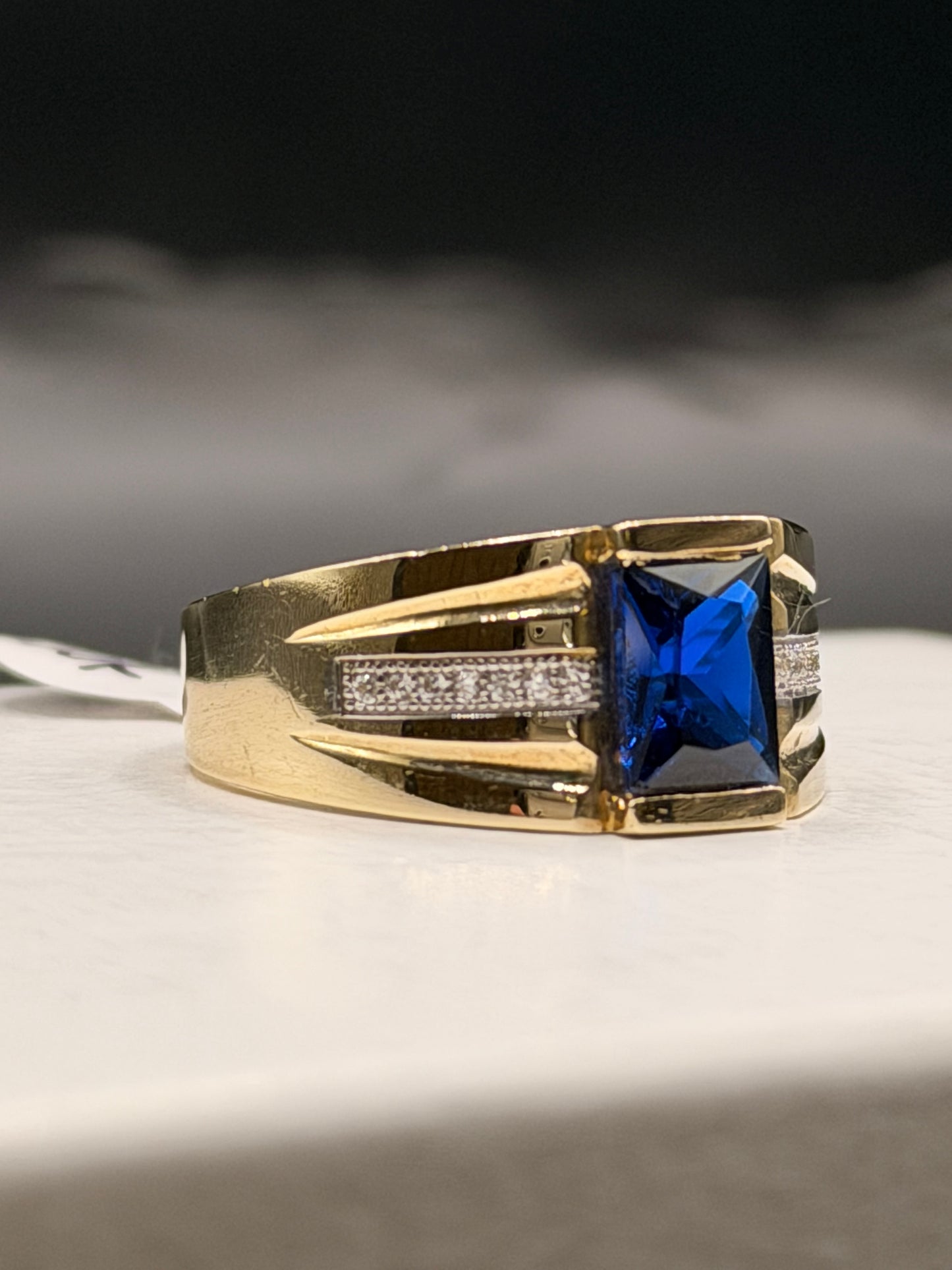 Men 10k yellow gold statement ring with blue center stone