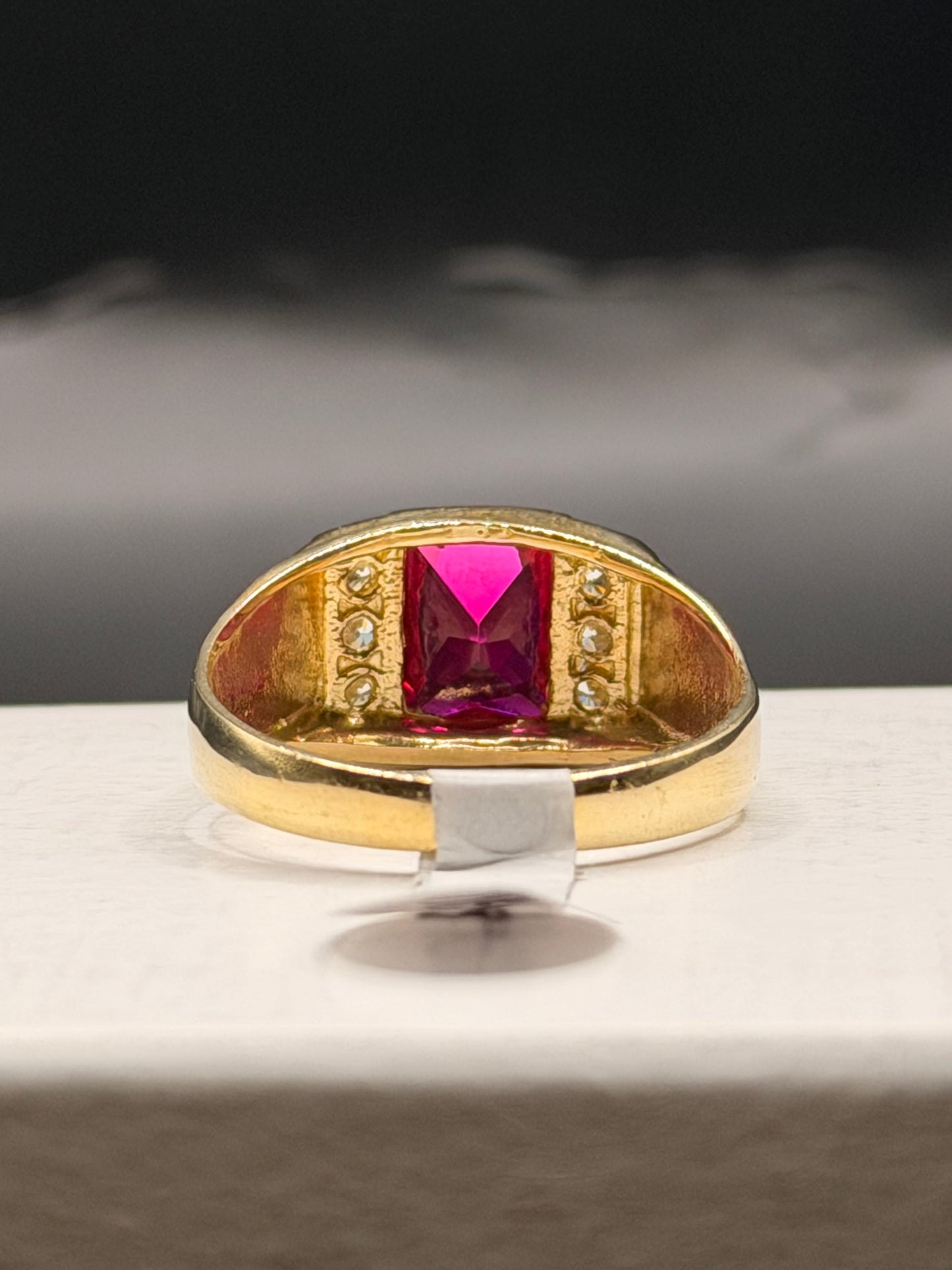 Men’s 10k yellow gold red stone ring with CZ accents