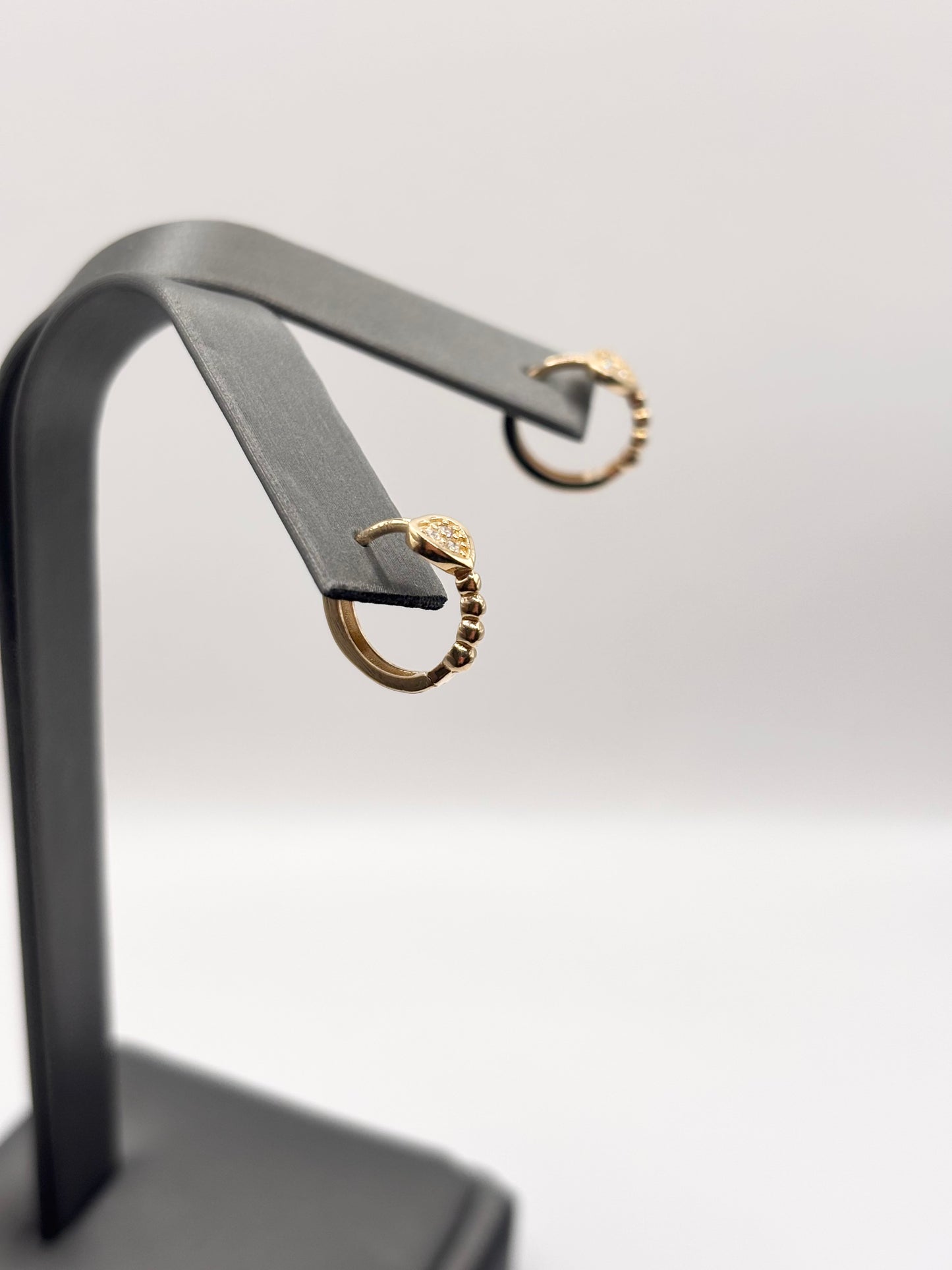 14k small huggies with heart