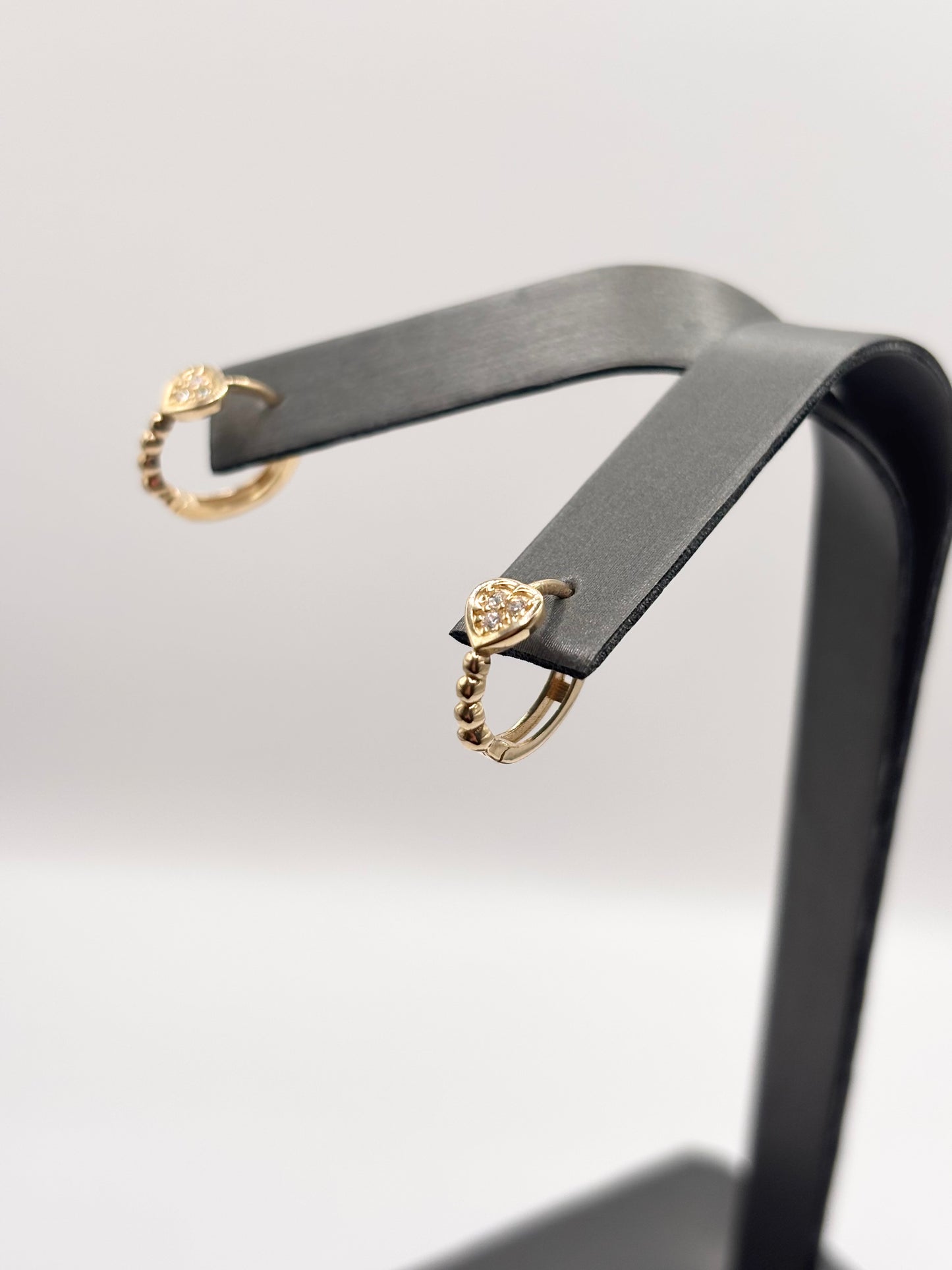 14k small huggies with heart