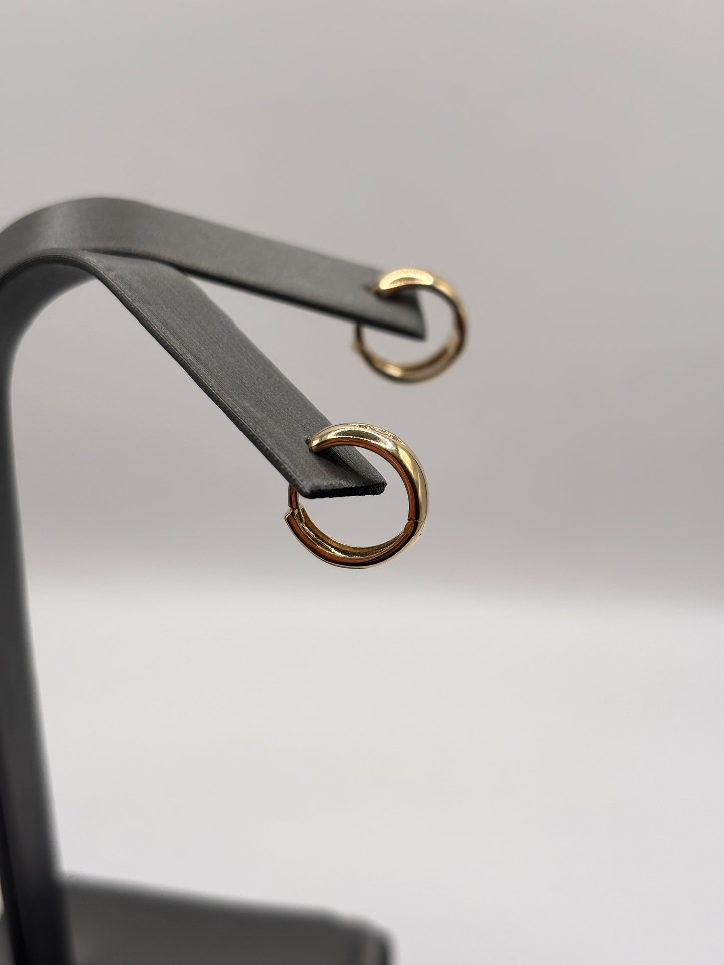 14k small huggies with cz