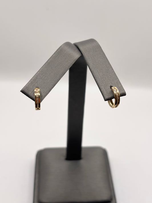 14k small huggies with zirconia