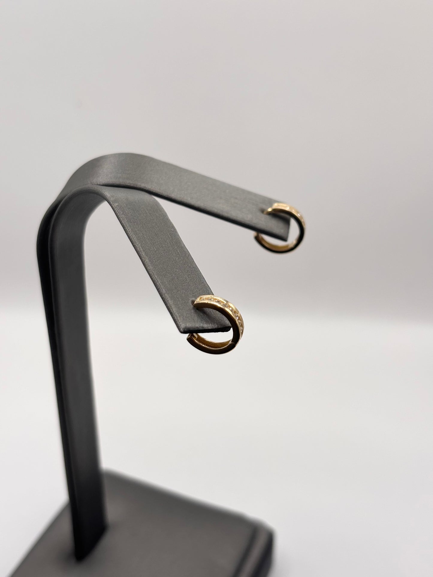 14k small huggies with zirconia