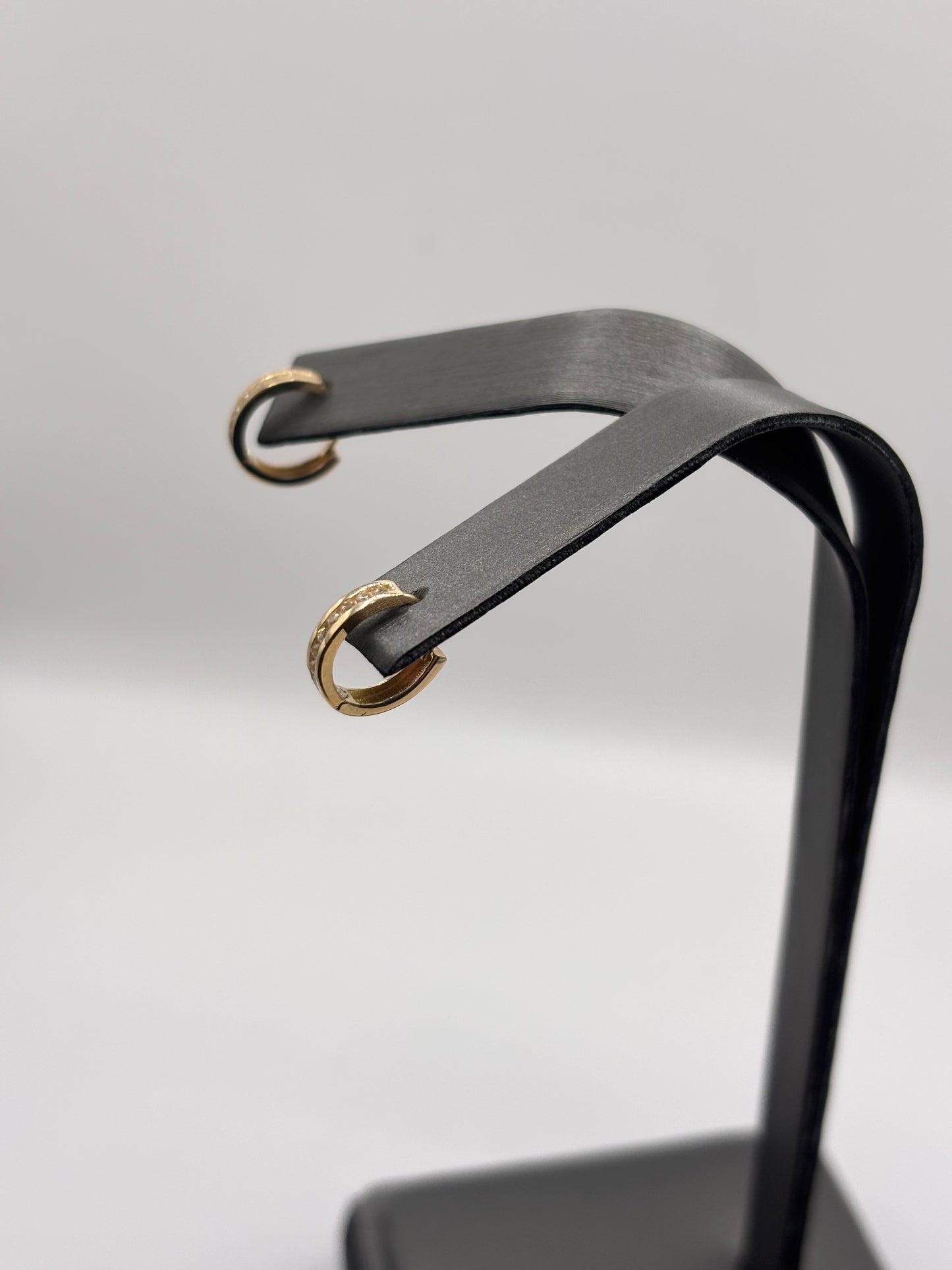 14k small huggies with zirconia